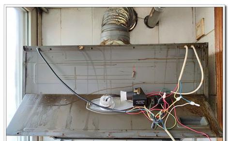 喷水式抽油烟机的清洗方法（轻松解决油烟困扰）
